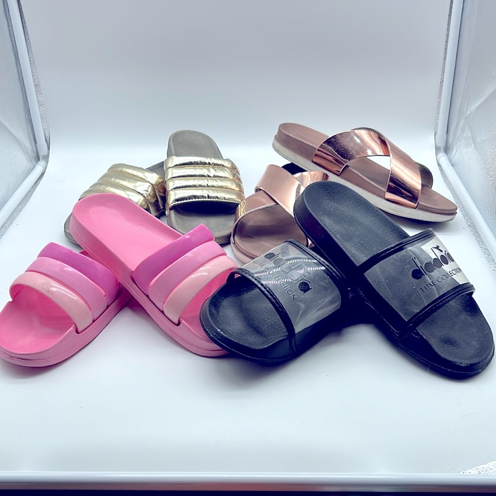Ladies 4 pairs of slides all size 9 in great condition, just need a good wash